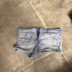 LIGHTWASH JEAN SHORTS WITH FLOWER DRAWING ON BACK KIDS SIZE 13-14YEAR OLDS